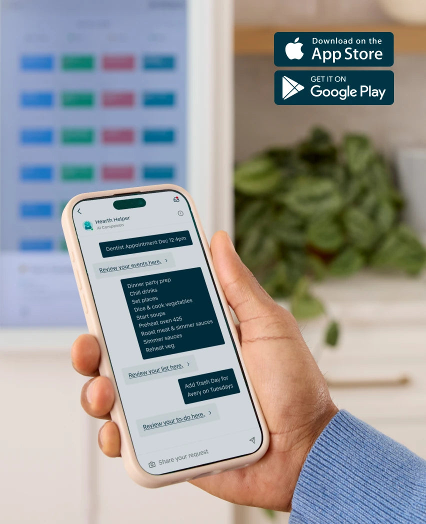 Hand holding a smartphone with an app interface, blurred office background